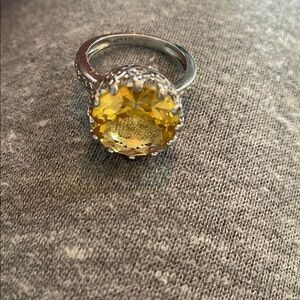 Elegant Silver Ring with Yellow Gemstone